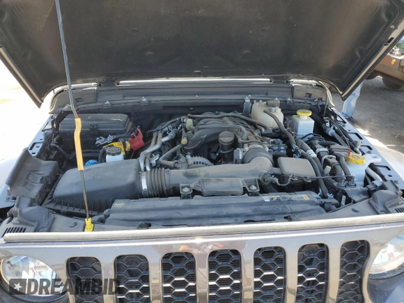 2022 Jeep Gladiator Willys Sport z VIN 1C6HJTAG2NL133000, wystawiony jako Copart lot #58416125 z przebiegiem 65 590 mil mil oraz Szkoda całkowita • Salvage title. Historia ofert i sprzedaży dostępna na DreamBid. Obrazek 11.