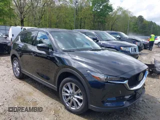 2019 Mazda CX-5 Grand Touring with VIN JM3KFBDM7K0518603, listed as a IAAI auction lot 39185478 with 42,805 mi miles. Bid and sale history available at carsss.com. Image 1.