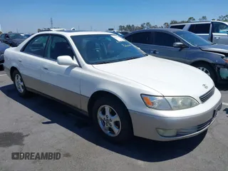 1997 Lexus ES 300 z VIN JT8BF22G5V0023891, wystawiony jako IAAI lot #42675659 z przebiegiem 195 090 mil mil oraz . Historia ofert i sprzedaży dostępna na DreamBid. Obrazek 1.