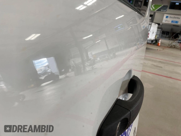 2020 Ford Transit Cargo with VIN 1FTBR1Y87LKA53852, listed as a IAAI auction lot 42300106 with 89,023 mi miles and . Bid and sale history available at DreamBid. Image 18.