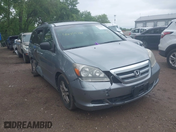 2007 Honda Odyssey EX z VIN 5FNRL38407B084436, wystawiony jako IAAI lot #42355391 z przebiegiem 144 607 mil mil oraz . Historia ofert i sprzedaży dostępna na DreamBid. Obrazek 1.