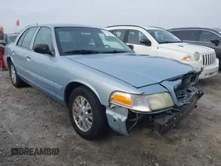 2003 Ford Crown Victoria LX z VIN 2FAFP74W83X180076, wystawiony jako IAAI lot #41744980 z przebiegiem 254 465 mil mil oraz . Historia ofert i sprzedaży dostępna na DreamBid. Obrazek 1.