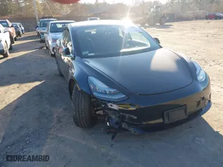 2018 Tesla Model 3 Long Range Battery with VIN 5YJ3E1EB7JF128057, listed as a IAAI auction lot 41086096 with 1 mi miles. Bid and sale history available at carsss.com. Image 1.