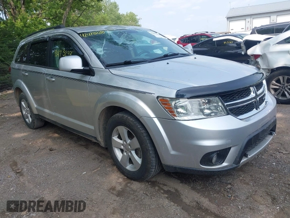 2012 Dodge Journey SXT with VIN 3C4PDDBG1CT323727, listed as a IAAI auction lot 42473238 with 77,035 mi miles and . Bid and sale history available at DreamBid. Image 1.