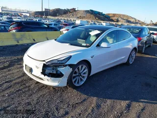 2020 Tesla Model 3 Long Range with VIN 5YJ3E1EB1LF796083, listed as a IAAI auction lot 41223450 with 119,497 mi miles. Bid and sale history available at carsss.com. Image 18.