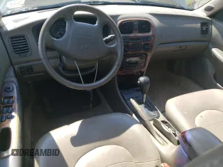 1999 Hyundai Sonata GLS with VIN KMHWF35V9XA100869, listed as a Copart auction lot 68219694 with 144,388 mi miles and Non Repairable. Bid and sale history available at carsss.com. Image 8.