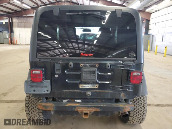 2004 Jeep Wrangler Sport with VIN 1J4FA49S64P722986, listed as a Copart auction lot 51840985 with 129,761 mi miles and Clean title. Bid and sale history available at DreamBid. Image 6.