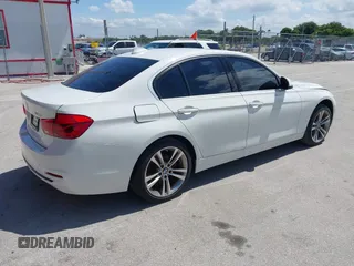 2018 BMW 3 Series 330i with VIN WBA8B9G52JNU57283, listed as a IAAI auction lot 42042507 with 51,740 mi miles and . Bid and sale history available at DreamBid. Image 4.