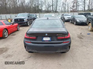 2020 BMW 3 Series M340i with VIN WBA5U7C02LAF54184, listed as a IAAI auction lot 41490697 with 57,363 mi miles. Bid and sale history available at carsss.com. Image 16.