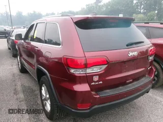 2021 Jeep Grand Cherokee Laredo X with VIN 1C4RJFAG3MC611583, listed as a IAAI auction lot 42631284 with 99,457 mi miles and . Bid and sale history available at DreamBid. Image 13.