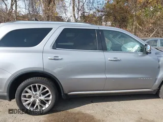 2014 Dodge Durango Citadel z VIN 1C4SDJET5EC509366, wystawiony jako IAAI lot #40735205 z przebiegiem 149 644 mil mil oraz . Historia ofert i sprzedaży dostępna na DreamBid. Obrazek 12.