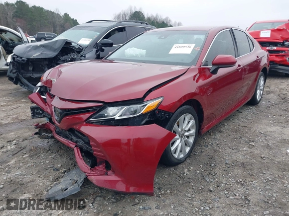 2020 Toyota Camry LE with VIN 4T1C11AK1LU359477, listed as a IAAI auction lot 41800546 with 109,319 mi miles and . Bid and sale history available at DreamBid. Image 18.