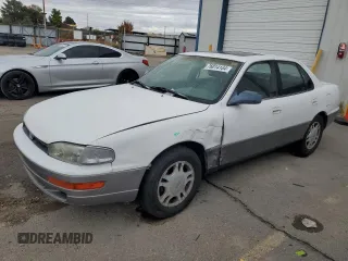 1994 Toyota Camry XLE with VIN JT2GK13E5R0008509, listed as a Copart auction lot 76014164 with 188,427 mi miles and Salvage Title. Bid and sale history available at carsss.com. Image 1.