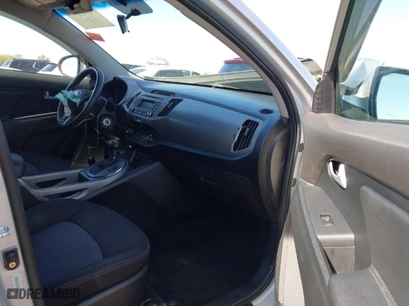 2015 Kia Sportage LX with VIN KNDPBCAC3F7678745, listed as a IAAI auction lot 41664074 with 124,526 mi miles. Bid and sale history available at carsss.com. Image 5.