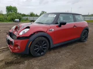 2016 MINI Hardtop S with VIN WMWXP7C57G3B33678, listed as a Copart auction lot 60609135 with 84,506 mi miles and Salvage title. Bid and sale history available at DreamBid. Image 1.