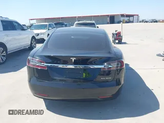 2020 Tesla Model S Long Range with VIN 5YJSA1E27LF397346, listed as a IAAI auction lot 40579015 with 43,779 mi miles and . Bid and sale history available at DreamBid. Image 16.