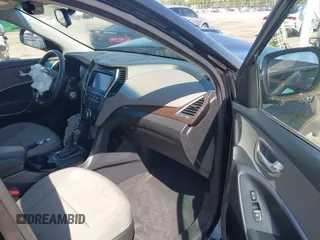 2017 Hyundai Santa Fe 2.4L z VIN 5NMZU3LB4HH024307, wystawiony jako IAAI lot #42147423 z przebiegiem 72 504 mil mil oraz . Historia ofert i sprzedaży dostępna na DreamBid. Obrazek 5.