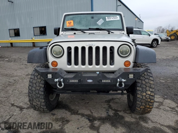 2007 Jeep Wrangler Unlimited X with VIN 1J4GA39177L105582, listed as a Copart auction lot 88912935 with 156,156 mi miles and Salvage Title. Bid and sale history available at DreamBid. Image 5.