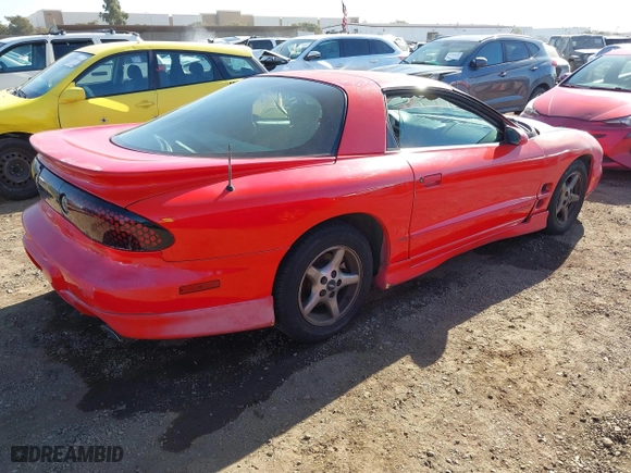 1999 Pontiac Firebird with VIN 2G2FS22K9X2208387, listed as a IAAI auction lot 41349447 with 221,291 mi miles. Bid and sale history available at carsss.com. Image 4.