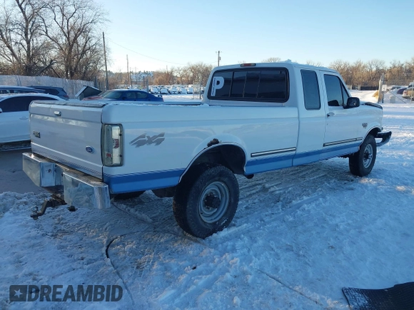1997 Ford F-250 HD with VIN 1FTHX26F1VEA49739, listed as a IAAI auction lot 41238799 with 337,959 mi miles. Bid and sale history available at carsss.com. Image 4.