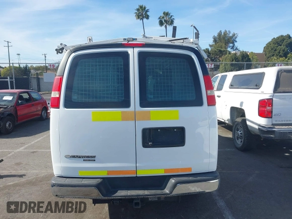 2014 Chevrolet Express Cargo Van with VIN 1GCWGFCB2E1122236, listed as a IAAI auction lot 41381131 with 70,696 mi miles. Bid and sale history available at carsss.com. Image 16.