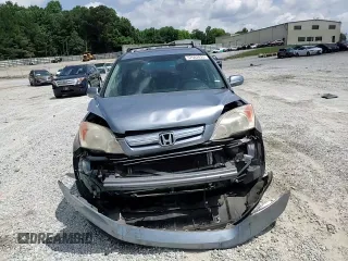 2007 Honda CR-V EX-L z VIN JHLRE38797C082267, wystawiony jako Copart lot #57602825 z przebiegiem 160 217 mil mil oraz Szkoda całkowita • Salvage title. Historia ofert i sprzedaży dostępna na DreamBid. Obrazek 14.