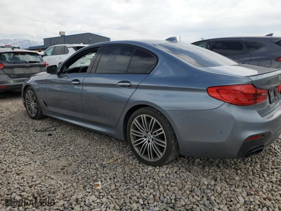 2018 BMW 5 Series M550i xDrive with VIN WBAJB9C51JB034980, listed as a Copart auction lot 51052495 with 55,705 mi miles and Clean Title. Bid and sale history available at carsss.com. Image 2.