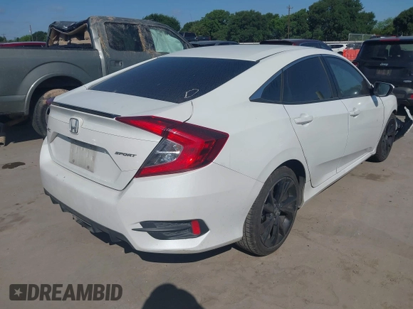 2019 Honda Civic Sport with VIN 19XFC2F81KE024702, listed as a IAAI auction lot 42018077 with 98,613 mi miles and . Bid and sale history available at DreamBid. Image 4.