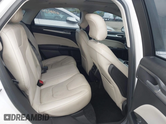 2016 Ford Fusion Titanium with VIN 3FA6P0K96GR103571, listed as a IAAI auction lot 42340764 with 180,870 mi miles and . Bid and sale history available at DreamBid. Image 7.