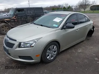 2014 Chevrolet Cruze LS with VIN 1G1PA5SG1E7391492, listed as a IAAI auction lot 41951818 with 103,285 mi miles and . Bid and sale history available at DreamBid. Image 2.