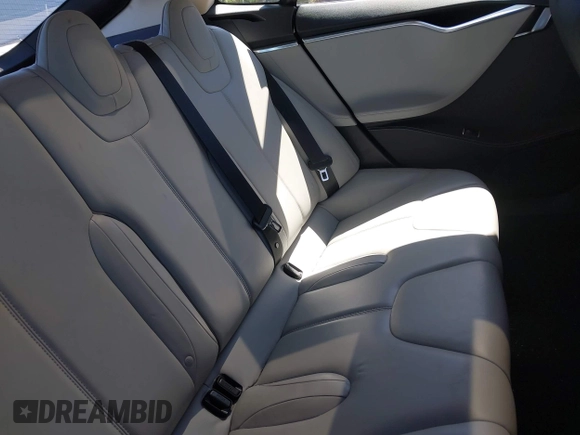 2014 Tesla Model S 60 z VIN 5YJSA1H17EFP33910, wystawiony jako IAAI lot #42346934 z przebiegiem Nie podano mil oraz . Historia ofert i sprzedaży dostępna na DreamBid. Obrazek 8.