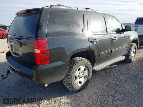2013 Chevrolet Tahoe LS with VIN 1GNSCAE03DR193235, listed as a IAAI auction lot 41604766 with 204,455 mi miles and . Bid and sale history available at DreamBid. Image 4.