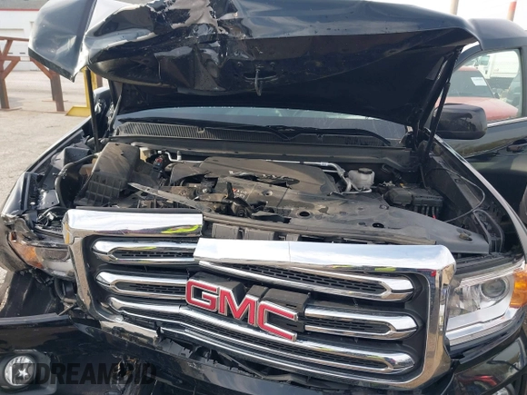 2019 GMC Canyon 4WD SLE z VIN 1GTG6CEN2K1354585, wystawiony jako IAAI lot #42014158 z przebiegiem 34 269 mil mil oraz . Historia ofert i sprzedaży dostępna na DreamBid. Obrazek 10.