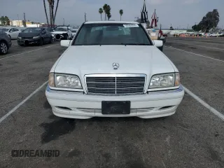 2000 Mercedes-Benz C 230 Kompressor with VIN WDBHA24G1YA820238, listed as a Copart auction lot 55563994 with 264,556 mi miles and Salvage Title. Bid and sale history available at carsss.com. Image 5.