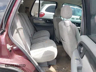2006 GMC Envoy SLT with VIN 1GKDS13S262181019, listed as a IAAI auction lot 40130930 with 190,525 mi miles. Bid and sale history available at carsss.com. Image 8.