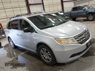 2011 Honda Odyssey EX-L with VIN 5FNRL5H66BB010332, listed as a IAAI auction lot 42419030 with 153,898 mi miles and . Bid and sale history available at DreamBid. Image 1.