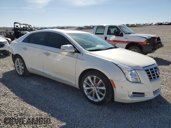 2014 Cadillac XTS Premium z VIN 2G61P5S35E9313677, wystawiony jako Copart lot #50205465 z przebiegiem 71 264 mil mil oraz Szkoda całkowita • Salvage title. Historia ofert i sprzedaży dostępna na DreamBid. Obrazek 4.