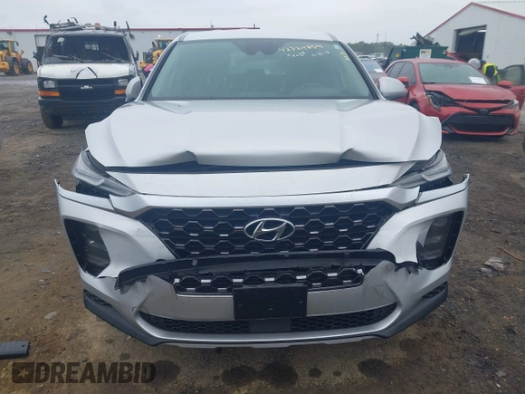 2019 Hyundai Santa Fe SE z VIN 5NMS23AD4KH130517, wystawiony jako IAAI lot #42324854 z przebiegiem 76 963 mil mil oraz . Historia ofert i sprzedaży dostępna na DreamBid. Obrazek 12.
