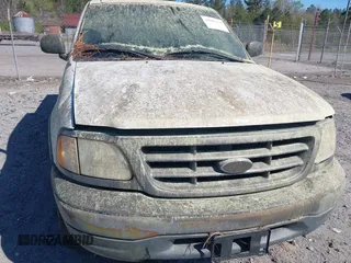 2001 Ford F-150 XL with VIN 1FTPX18L91NB97690, listed as a IAAI auction lot 41886760 with 1 mi miles. Bid and sale history available at carsss.com. Image 6.