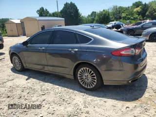 2016 Ford Fusion Titanium with VIN 3FA6P0K9XGR109499, listed as a Copart auction lot 61858445 with 192,272 mi miles and Clean title. Bid and sale history available at DreamBid. Image 2.