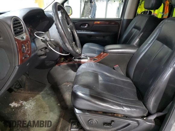 2005 GMC Envoy SLT with VIN 1GKDT13SX52287052, listed as a Copart auction lot 44387855 with 0 mi miles and Salvage Title. Bid and sale history available at carsss.com. Image 7.