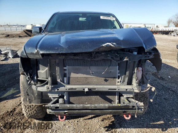 2021 GMC Canyon 4WD AT4 w/Leather with VIN 1GTG6FEN3M1274409, listed as a Copart auction lot 42502355 with 57,194 mi miles and Salvage Title. Bid and sale history available at carsss.com. Image 5.