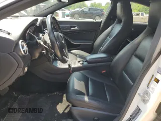 2014 Mercedes-Benz CLA 250 with VIN WDDSJ4GBXEN104886, listed as a Copart auction lot 60210115 with 219,043 mi miles and Salvage title. Bid and sale history available at DreamBid. Image 7.