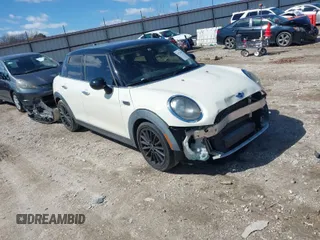 2017 MINI Hardtop 4 Door Cooper with VIN WMWXU1C5XH2E18842, listed as a IAAI auction lot 41718807 with 96,646 mi miles and . Bid and sale history available at DreamBid. Image 1.