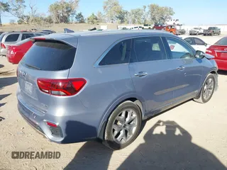 2020 Kia Sorento SX z VIN 5XYPKDA58LG686586, wystawiony jako IAAI lot #40502030 z przebiegiem 76 546 mil mil oraz . Historia ofert i sprzedaży dostępna na DreamBid. Obrazek 4.