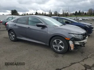 2019 Honda Civic LX with VIN 2HGFC2F69KH566604, listed as a Copart auction lot 47246575 with 127,755 mi miles and Salvage Title. Bid and sale history available at DreamBid. Image 4.