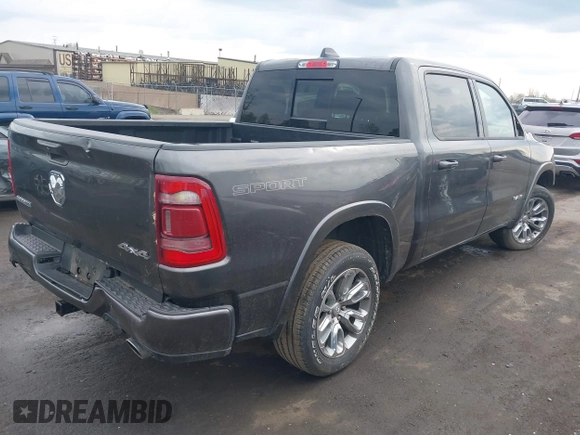 2022 Ram 1500 Laramie with VIN 1C6SRFJT3NN400159, listed as a IAAI auction lot 42167812 with 16,790 mi miles and . Bid and sale history available at DreamBid. Image 4.