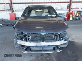2021 BMW X1 xDrive28i with VIN WBXJG9C02M5T41170, listed as a IAAI auction lot 41886408 with 56,316 mi miles. Bid and sale history available at carsss.com. Image 13.