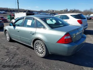 2005 Mercury Montego Premier with VIN 1MEFM42165G618285, listed as a IAAI auction lot 41595913 with 127,811 mi miles. Bid and sale history available at carsss.com. Image 3.