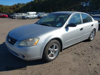 2002 Nissan Altima SL with VIN 1N4AL11E82C215662, listed as a IAAI auction lot 40637969 with 999,999 mi miles. Bid and sale history available at carsss.com. Image 2.